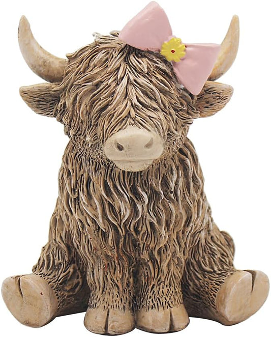 The Leonardo Collection Happy Highland Cow - Pretty in Pink - Highland Cow Sitting with Bow Figurine