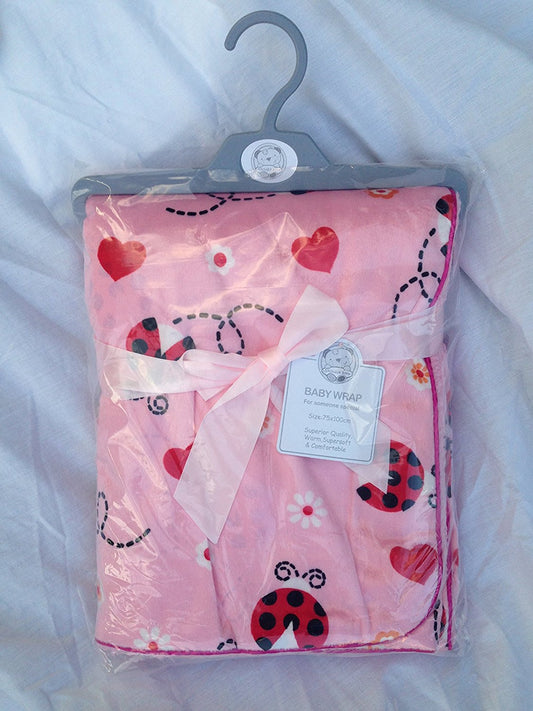 SOFT FLEECY BABY WRAP OR BLANKET 75CMS X 100CMS PINK WITH LADYBIRDS - hanrattycraftsgifts.co.uk